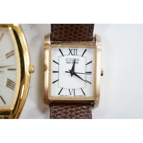 946 - A gentleman's recent gilt metal Citizen Eco-Drive wrist watch and one other Citizen watch. Condition... 