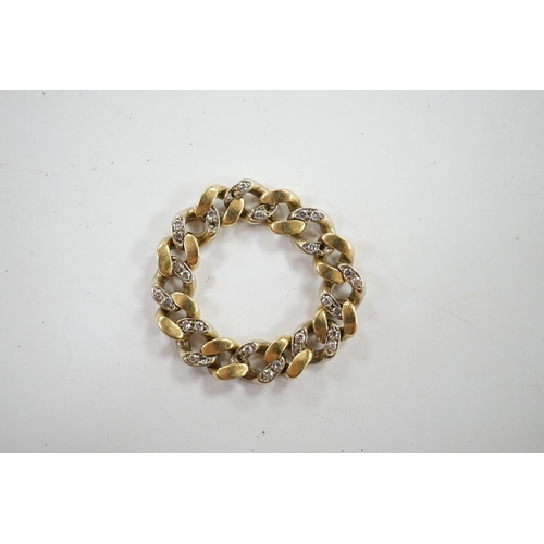 947 - A modern two colour 750 and diamond chip cluster set curb link articulated ring, size U/V, gross wei... 