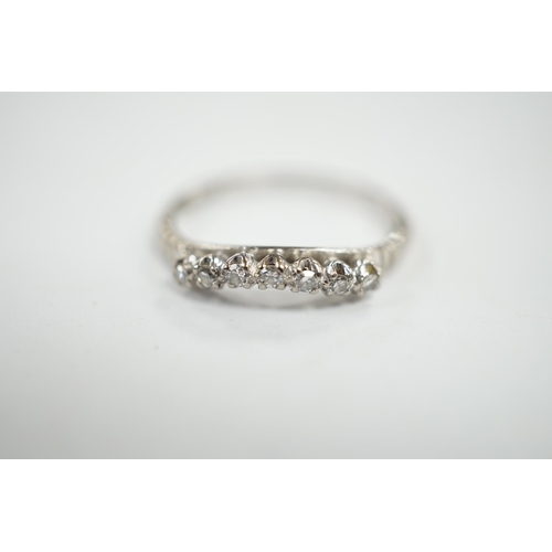 949 - An 18ct, plat and seven stone diamond chip set 'chevron' half hoop ring, size O, gross weight 2.5 gr... 