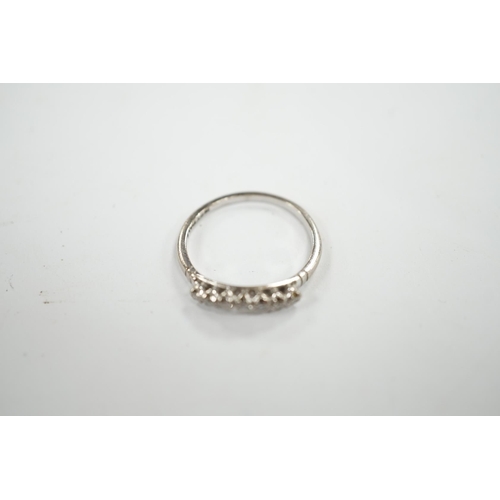 949 - An 18ct, plat and seven stone diamond chip set 'chevron' half hoop ring, size O, gross weight 2.5 gr... 