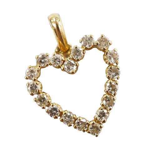 950 - A modern 18k and diamond cluster set open work heart shaped pendant, overall 21mm, gross weight 2.7 ... 