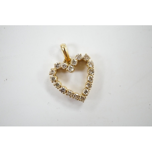 950 - A modern 18k and diamond cluster set open work heart shaped pendant, overall 21mm, gross weight 2.7 ... 