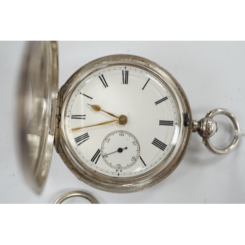 954 - A late Victorian silver half hunter pocket watch and a later silver open faced pocket watch. Conditi... 