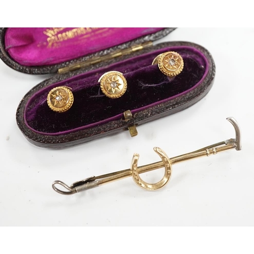 955 - An Edwardian cased set of three 9ct and rose cut diamond set dress studs and a 9ct and silver riding... 