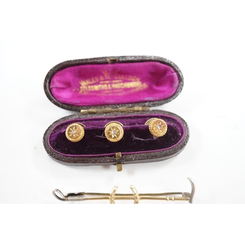 955 - An Edwardian cased set of three 9ct and rose cut diamond set dress studs and a 9ct and silver riding... 