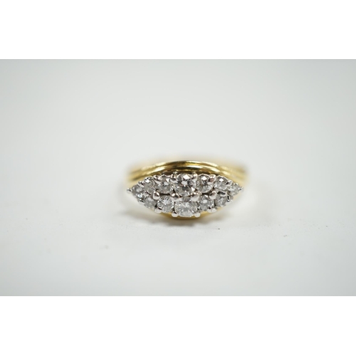 956 - A modern 18ct gold and navette shaped diamond cluster set ring, size Q, gross weight 4.4 grams. Cond... 