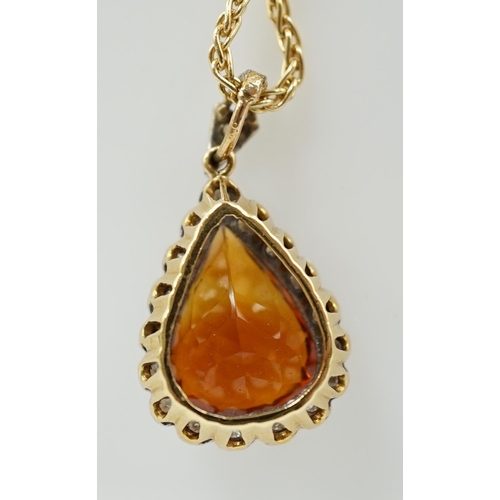 991 - A recent 18k gold, platinum and single stone pear cut citrine pendant, with diamond chip border, on ... 