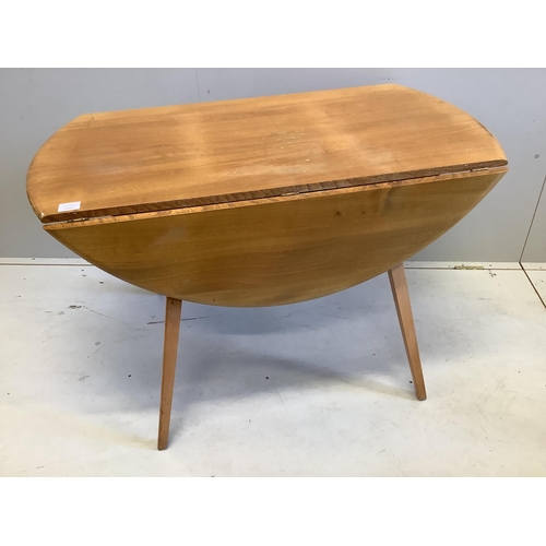 1012 - An Ercol circular elm and beech drop flap dining table, diameter 112cm, height 71cm, and four Ercol ... 