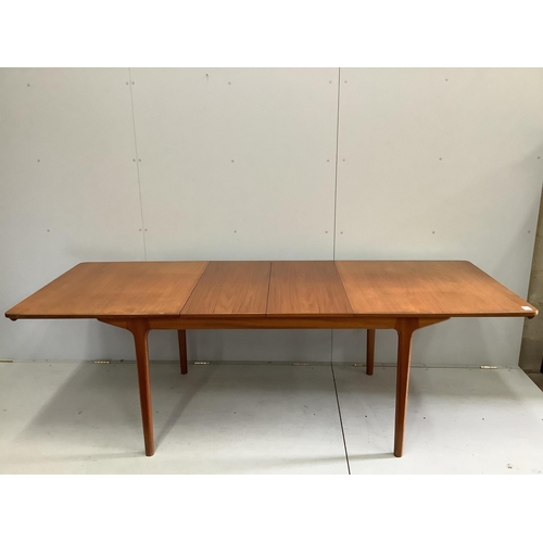 1018 - McIntosh of Kirkcaldy, a mid century teak extending dining table, width 159cm, depth 89cm, height 74... 