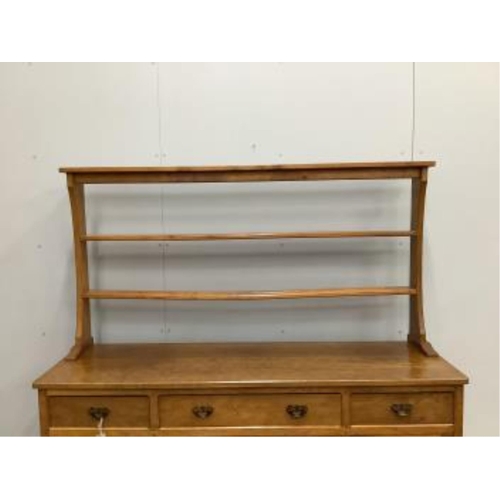 1029 - Alan Grainger 'Acorn Man', a mid century adzed oak dresser with open plate rack, width 160cm, depth ... 