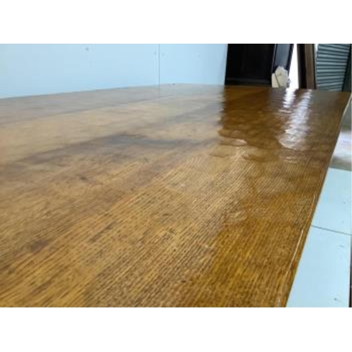 1030 - Alan Grainger 'Acorn Man', a rectangular adzed oak refectory dining table on trestle supports, width... 