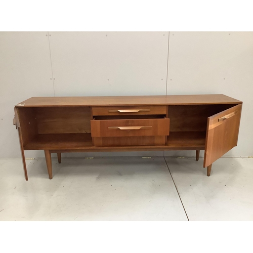 1033 - A mid century teak sideboard, width 198cm, depth 43cm, height 73cm. Condition - fair