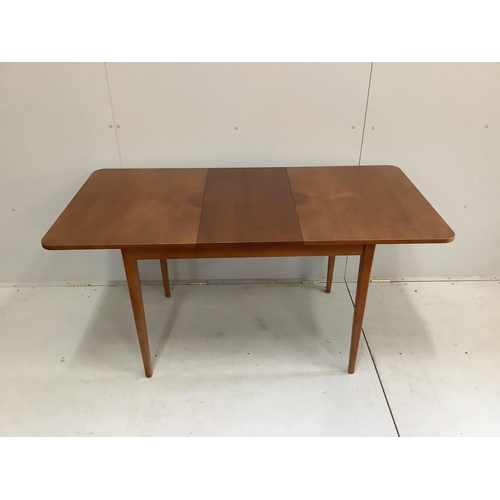 1041 - A mid century teak dining table and a set of four chairs. Condition - fair