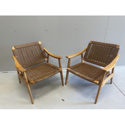 1057 - A mid century caned teak three piece lounge suite, settee width 174cm, depth 68cm, height  71cm. Con... 