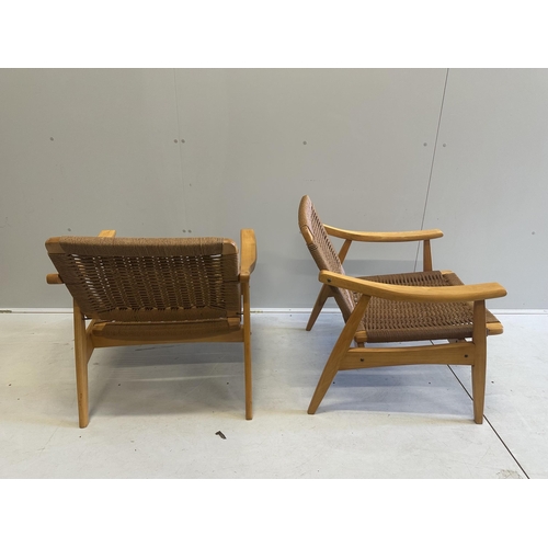 1057 - A mid century caned teak three piece lounge suite, settee width 174cm, depth 68cm, height  71cm. Con... 