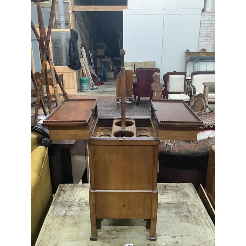 1103 - An early 20th century brass mounted mahogany 'Surprise' patent drink's cabinet, retailed by Goldsmit... 