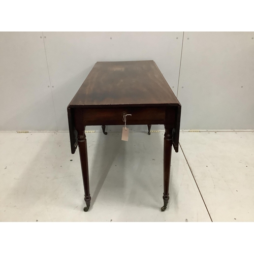 1125 - A Regency mahogany Pembroke table, on turned legs with castors, width 112cm, depth 53cm, height 72cm... 