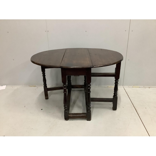 1133 - A small 17th century and later oak gateleg table, width 86cm, depth 31cm, height 68cm. Condition - f... 