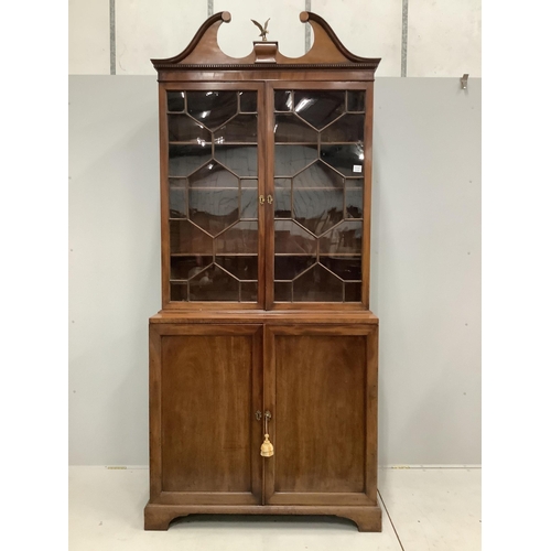 1151 - A George III mahogany bookcase cupboard, width 110cm, depth 56cm, height 248cm. Condition - fair... 