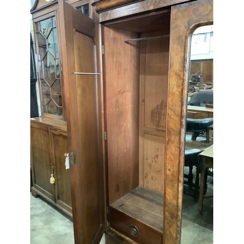 1152 - A Victorian figured walnut mirrored compactum wardrobe, width 192cm, depth 49cm, height 208cm. Condi... 