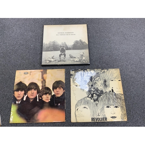 1283 - Seven The Beatles and George Harrison LP record albums; the White Album (No.0174927), Abbey Road, ... 