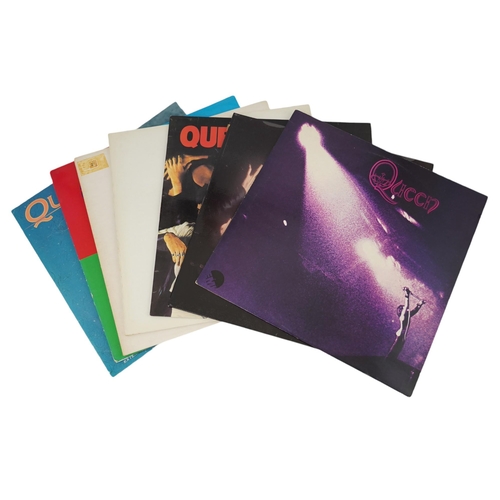 1292 - Seven Queen LP record albums and a 12 single; Queen, Queen II, Sheer Heart Attack, A Night at the O... 