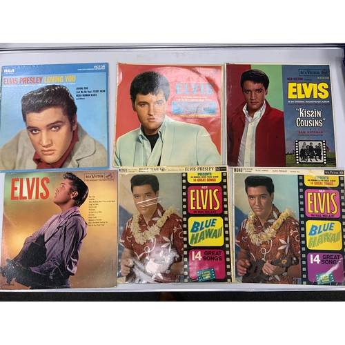 1304 - Sixteen Elvis Presley LP record albums including; It Happened at the Worlds Fair, Paradise Hawaiian... 