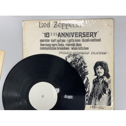 1328 - Three Led Zeppelin LP record albums; Led Zeppelin IV, K50008, Houses of the Holy, SSK89400, and anot... 