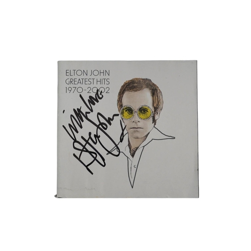 1350 - A signed Elton John CD; Greatest Hits 1970-2002, signed to the cover of the booklet in black ink, pu... 