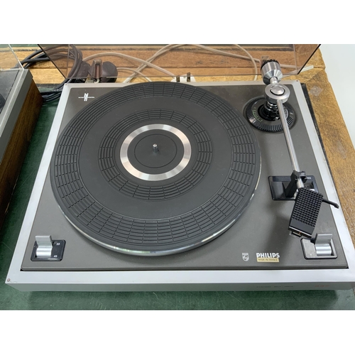 1352 - Two record players; a Philips 437 turntable together with a Pioneer PL-112D turntable, both with lea... 