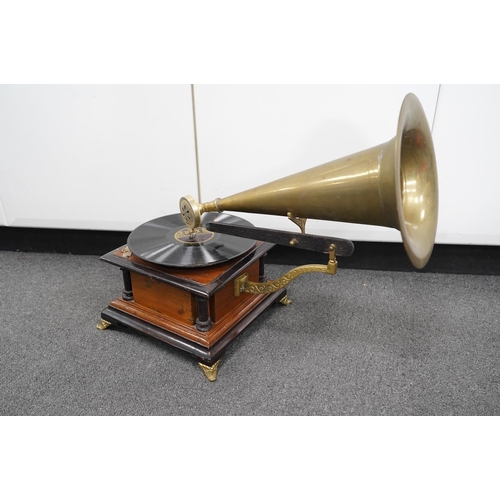 1359 - An early 20th century His Masters Voice mahogany and ebonised gramophone with brass horn, base 29 ... 