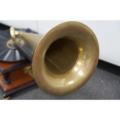 1359 - An early 20th century His Masters Voice mahogany and ebonised gramophone with brass horn, base 29 ... 