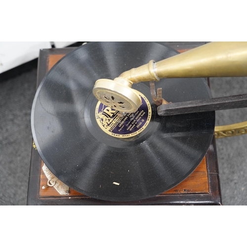 1359 - An early 20th century His Masters Voice mahogany and ebonised gramophone with brass horn, base 29 ... 