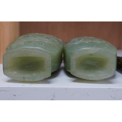 1405 - A pair of Chinese carved green quartz vases and covers, 21cm. Condition - fair, natural crack to bod... 