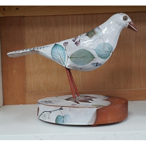 1412 - Marion Brandis (Modern British), a partially tin glazed art pottery model of a bird, 28cm tall. Cond... 