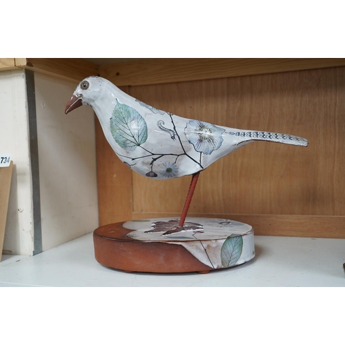 1412 - Marion Brandis (Modern British), a partially tin glazed art pottery model of a bird, 28cm tall. Cond... 