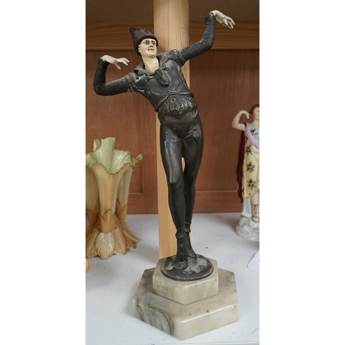 1415 - An Art Deco resin and patinated spelter model of a dancer on onyx base, 30cm. Condition - poor... 