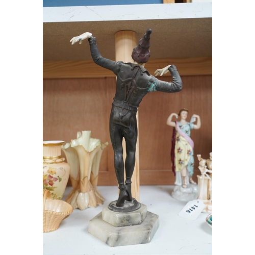 1415 - An Art Deco resin and patinated spelter model of a dancer on onyx base, 30cm. Condition - poor... 