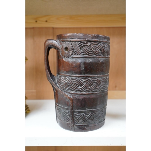 1420 - A Scandinavian carved wood tankard, lacking lid, 24cm. Condition - commensurate with age