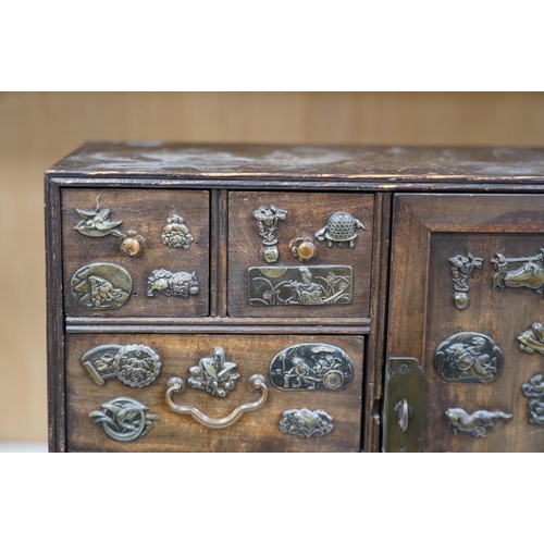 1430 - A late 19th century Japanese desk top dansu cabinet, 33.5x 29cm. Condition - fair