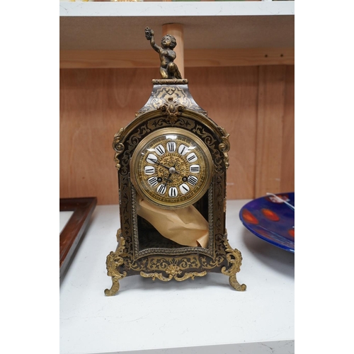 1440 - A late 19th century French boulle work mantel clock, with key and pendulum, 40cm. Condition - fair t... 