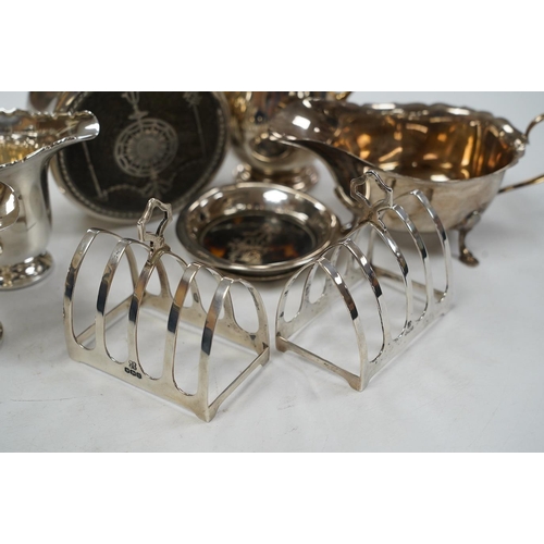 1841 - Sundry small silver including a pair of toast racks, Sheffield, 1936, three cream jugs, a sauceboat ... 