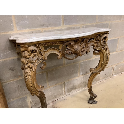 109 - A Victorian giltwood and composition marble top serpentine console table, width 93cm, depth 37cm, he... 