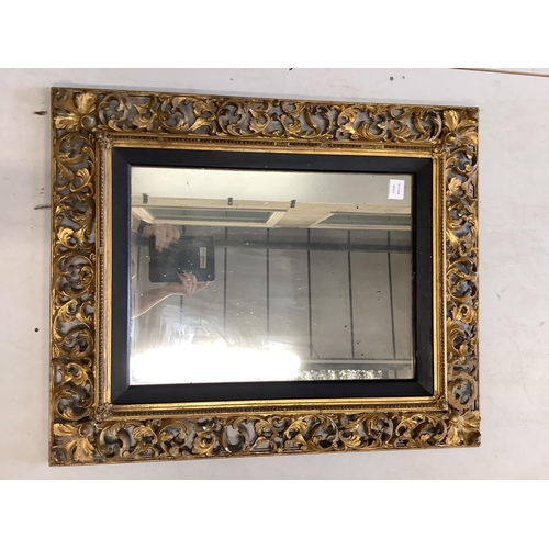 114 - A Florentine style rectangular giltwood and composition wall mirror, width 74cm, height 90cm. Condit... 