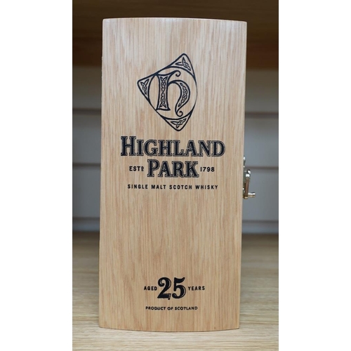 265 - A wood cased bottle of Highland Park 25 year old whisky. Condition - good