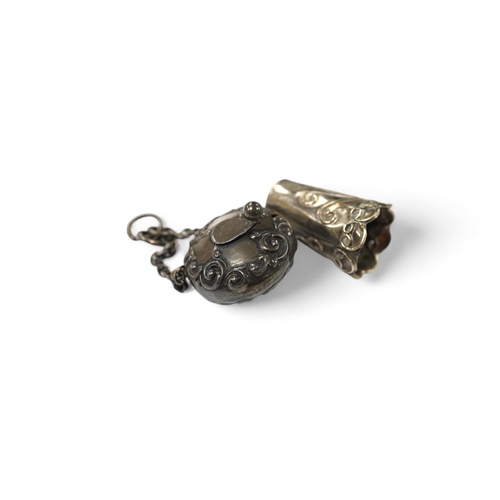 872 - A late Victorian silver tape measure case, Birmingham, 1898, 25mm, with suspension chain and a white... 