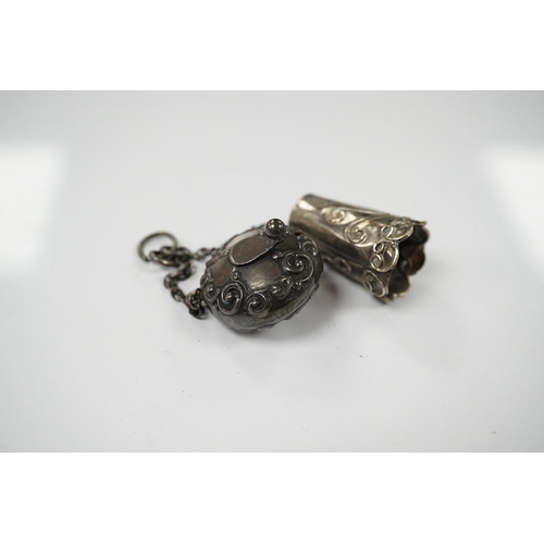 872 - A late Victorian silver tape measure case, Birmingham, 1898, 25mm, with suspension chain and a white... 