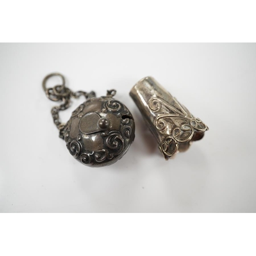 872 - A late Victorian silver tape measure case, Birmingham, 1898, 25mm, with suspension chain and a white... 