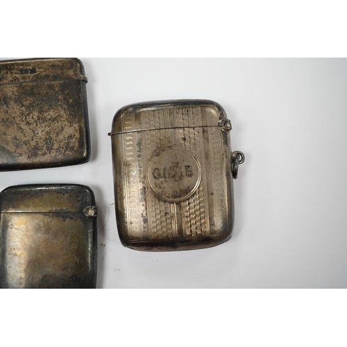 874 - Five assorted late 19th/early 20th century silver vesta cases, largest 58mm. Condition - poor to fai... 