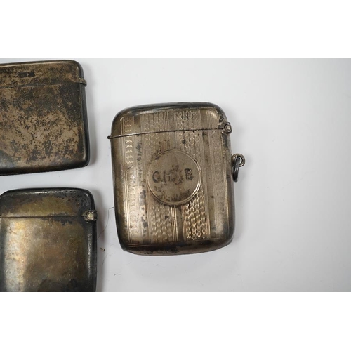 874 - Five assorted late 19th/early 20th century silver vesta cases, largest 58mm. Condition - poor to fai... 